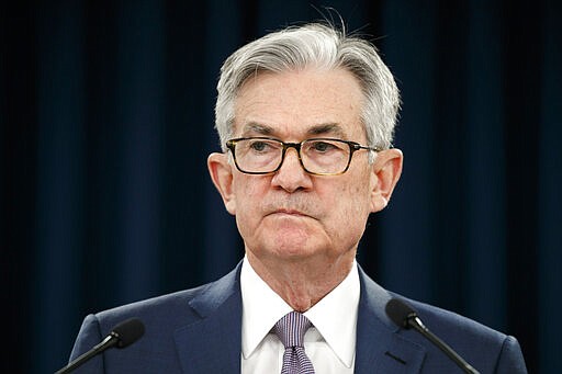 Federal Reserve Chair Jerome Powell pauses during a news conference, Tuesday, March 3, 2020, while discussing an announcement from the Federal Open Market Committee, in Washington. In a surprise move, the Federal Reserve cut its benchmark interest rate by a sizable half-percentage point in an effort to support the economy in the face of the spreading coronavirus. Chairman Jerome Powell noted that the coronavirus &quot;poses evolving risks to economic activity.&quot; (AP Photo/Jacquelyn Martin)