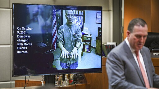 Deputy District Attorney John Lewin gestures during the second day of opening statements of Robert Durst's murder trial at the Airport Branch Courthouse in Los Angeles Thursday, March 5, 2020. Lewin gave the jury biographies of Durst and Berman, who met as students at UCLA in the 1960s, casting him as the careless millionaire son of a real estate giant who didn't believe rules applied to him, and her as the daughter of a Las Vegas mobster who learned from her father that nothing was more important than loyalty. (Robyn Beck/AFP via AP, Pool)