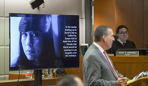 Deputy District Attorney John Lewin gestures during the second day of opening statements of Durst's murder trial at the Airport Branch Courthouse in Los Angeles Thursday, March 5, 2020. &quot;Bob Durst killed his wife,&quot; Deputy District Attorney John Lewin said at one point during his opening statement at the trial of the real estate heir Durst, who is charged only with the murder of his friend Susan Berman in 2000. At right, Los Angeles County Superior Court Judge Mark E. Windham. (Robyn Beck/AFP via AP, Pool)