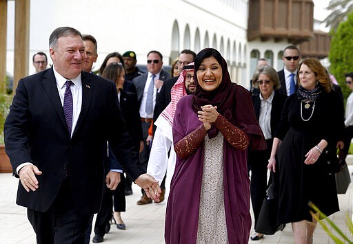 FILE - In this Feb. 20, 2020, file photo, U.S. Secretary of State Mike Pompeo, left, walks with Saudi ambassador to the United States Princess Reema Bint Bandar at Princess Reema's Palace in Riyadh. With Joe Biden re-emerging as the front-runner in the Democratic presidential race, Saudi Arabia's ambassador to the United States dismisses Biden's description of the kingdom as a &quot;pariah.&quot; Ambassador Princess Reema bint Bandar Al Saud said in an interview with The Associated Press recent presidents have always carried on a good relationship between the two countries after taking office. (Andrew Caballero-Reynolds/Pool Photo via AP, File)