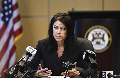 Michigan Attorney General Dana Nessel addresses the media during a news conference, Thursday, March 5, 2020, in Lansing, Mich. She said her office will not consider a request from the University of Michigan to investigate sexual assault allegations against Dr. Robert E. Anderson unless they waive all privileges. (Matthew Dae Smith/Lansing State Journal via AP)