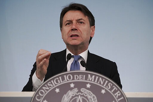 Italian Premier Giuseppe Conte speaks during a press conference on economic measures to help facing consequences of the virus outbreak, in Rome, Thursday, March 5, 2020. (AP Photo/Andrew Medichini)