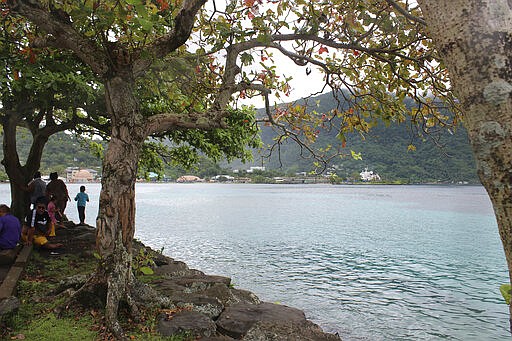 This photo shows people at Utulei Beach Park in Pago Pago, American Samoa on Wednesday, March 4, 2020. Mike Bloomberg spent more than $500 million to net one presidential primary win in the U.S. territory of American Samoa. His lone victory in the group of islands with a population of 55,000 was an unorthodox end to his much-hyped but short-lived campaign that ended Wednesday. (AP Photo/Fili Sagapolutele)