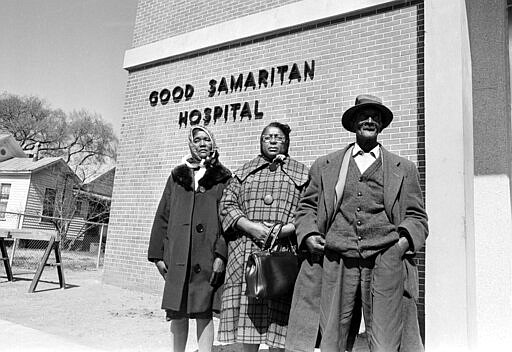 FILE - In this February 1965 , file photo, Viola Jackson, left, mother of Jimmie Lee Jackson, 26, who died, Feb. 26, 1965 at a Selma, Ala., hospital from a gunshot wound suffered in race violence in Marion, Ala. Also pictured is his cousin Rachel Thomas, center, and Cager Lee, grandfather. (AP Photo/Horace Cort, File)