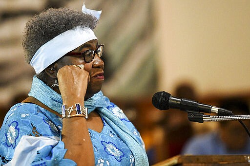 In this Feb. 16, 2020, photo, Julia Cash, cousin of Jimmie Lee Jackson, speaks at the Marion Baptist Academy in Marion, Ala. &quot;Jimmie was one of the nicest, most mannerable persons that I knew. He always had a smile on his face,&quot; Cash said, &quot;and what was most impressive is he always took time for older people.&quot; (AP Photo/Julie Bennett)