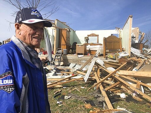 Billy Leath, 86, shows the bedroom Wednesday, March 4, 2020 where he and his 83-year-old wife sheltered from the tornado that destroyed his Putnam County, Tennessee, neighborhood early Tuesday. (AP Photo/Travis Loller)