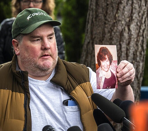 Mike Weatherill, whose mother died a day earlier, speaks during a news conference, Thursday, March 5, 2020, in Kirkland, Wash. Family members of residents of the nursing home where multiple people have died from the coronavirus spoke to the media about their loved ones as Washington state authorities reported dozens more cases. (Steve Ringman/The Seattle Times via AP)