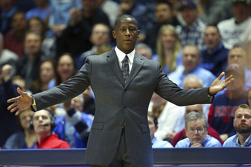 Dayton head coach Anthony Grant reacts to a non-call by the officials during the first half of an NCAA college basketball game against Rhode Island Wednesday, March 4, 2020, in Kingston, R.I. (AP Photo/Stew Milne)