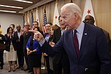 Biden invokes Obama, swipes at Sanders with six-state ad buy