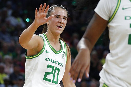 Oregon's Sabrina Ionescu (20) celebrates after a play against Utah during the first half of an NCAA college basketball game in the quarterfinal round of the Pac-12 women's tournament Friday, March 6, 2020, in Las Vegas. (AP Photo/John Locher)