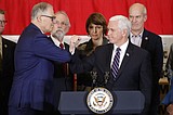 Pence walks fine line on coronavirus response