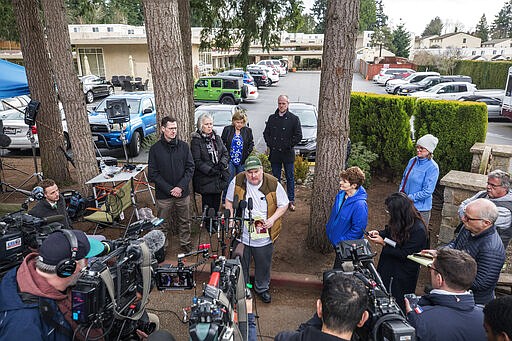 Mike Weatherill, whose mother died a day earlier, speaks during a news conference, Thursday, March 5, 2020, in Kirkland, Wash. Family members of residents of the nursing home where multiple people have died from the coronavirus spoke to the media about their loved ones as Washington state authorities reported dozens more cases. (Steve Ringman/The Seattle Times via AP)