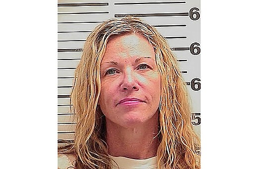 This photo released Friday, March 6, 2020 by the Madison County Sheriff's Office shows Lori Vallow, also known as Lori Daybell. The mother of two children missing for nearly six months had her bond reduced to $1 million Friday during her first court appearance on child abandonment charges in Idaho. Her two youngest children, 7-year-old Joshua &quot;JJ&quot; Vallow and 17-year-old Tylee Ryan, were last seen in September 2019 and police in eastern Idaho say both Lori Daybell and her new husband Chad Daybell have lied about the children's whereabouts. (Madison County Sheriff's Office via AP)