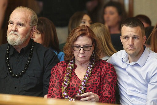 Larry Woodcock, from left, Kay Woodcock and Brandon Boudreaux attend the hearing for Lori Vallow Daybell on Friday, March 6, 2020, in Rexburg, Idaho. Daybell who is charged with felony child abandonment after her two children went missing nearly six months ago had her bond reduced to $1 million by an Idaho judge on Friday. (John Roark/The Idaho Post-Register via AP, Pool)