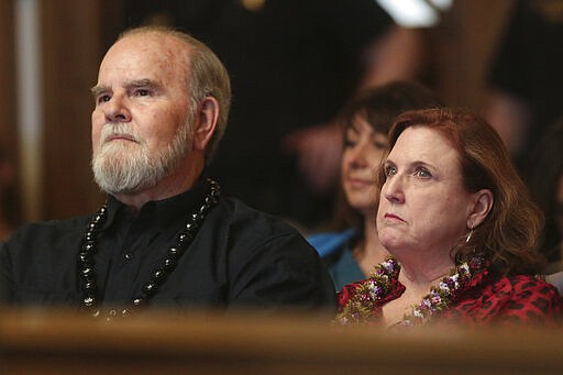 Larry and Kay Woodcock listen during the hearing of Lori Vallow Daybell on Friday, March 6, 2020, in Rexburg, Idaho. Daybell who is charged with felony child abandonment after her two children went missing nearly six months ago had her bond reduced to $1 million by an Idaho judge on Friday. (John Roark/The Idaho Post-Register via AP, Pool)