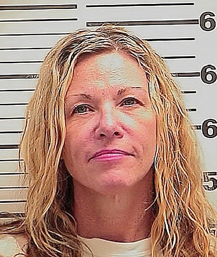 This photo released Friday, March 6, 2020 by the Madison County Sheriff's Office shows Lori Vallow, also known as Lori Daybell. The mother of two children missing for nearly six months had her bond reduced to $1 million Friday during her first court appearance on child abandonment charges in Idaho. Her two youngest children, 7-year-old Joshua &quot;JJ&quot; Vallow and 17-year-old Tylee Ryan, were last seen in September 2019 and police in eastern Idaho say both Lori Daybell and her new husband Chad Daybell have lied about the children's whereabouts. (Madison County Sheriff's Office via AP)