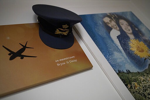 Pictures and mementos of their son Bryce and his girlfriend Daisy, still adorn the walls of the house of Silene and Rob Fredriksz in Rotterdam, Netherlands, Tuesday, Feb. 25, 2020. United by grief across oceans and continents, families who lost loved ones when Malaysia Airlines Flight 17 was shot down in 2014 hope that a trial starting next week will finally deliver them something that has remained elusive ever since: The truth. (AP Photo/Peter Dejong)