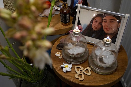 Pictures and mementos of their son Bryce and his girlfriend Daisy, still adorn the walls of the house of Silene and Rob Fredriksz in Rotterdam, Netherlands, Tuesday, Feb. 25, 2020. United by grief across oceans and continents, families who lost loved ones when Malaysia Airlines Flight 17 was shot down in 2014 hope that a trial starting next week will finally deliver them something that has remained elusive ever since: The truth. (AP Photo/Peter Dejong)