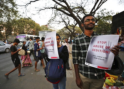 In this Tuesday, Feb. 4, 2020 photo, Indians hold placards during a protest against the sedition case filed by police against a school after a play preformed by students denouncing a new citizenship law, in Bangalore, India. Critics, intellectuals, human rights activists, filmmakers, students and journalists in seen as opposed to Indian Prime Minister Narendra Modi's&#160;government are being increasingly silenced under a colonial-era sedition law. Official data reveal as many as 332 people were arrested under the law between 2016 and 2018, though only seven were convicted, suggesting that the police&#160;have struggled to gather evidence against the accused. (AP Photo/Aijaz Rahi)