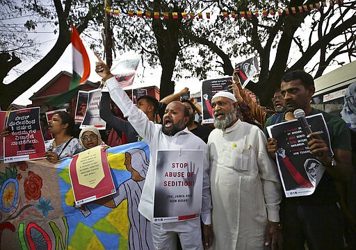 In this Tuesday, Feb. 4, 2020 photo, Indians hold placards and shout slogans during a protest against the sedition case filed by police against a school after a play preformed by students denouncing a new citizenship law, in Bangalore, India. Critics, intellectuals, human rights activists, filmmakers, students and journalists in seen as opposed to Indian Prime Minister Narendra Modi's&#160;government are being increasingly silenced under a colonial-era sedition law. Official data reveal as many as 332 people were arrested under the law between 2016 and 2018, though only seven were convicted, suggesting that the police&#160;have struggled to gather evidence against the accused. (AP Photo/Aijaz Rahi)