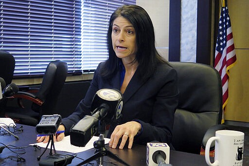 Michigan Attorney General Dana Nessel addresses the media during a news conference, Thursday, March 5, 2020, in Lansing, Mich. She said any investigation into alleged sexual assaults committed by the late Dr. Robert Anderson would require full cooperation by the University of Michigan and an appropriation by the Legislature to cover costs. (AP Photo/David Eggert)