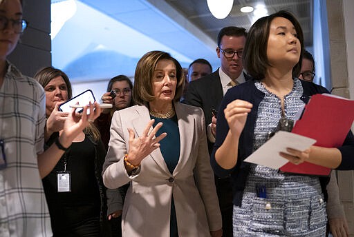 Speaker of the House Nancy Pelosi, D-Calif., arrives to meet with Vice President Mike Pence and the White House coronavirus task force leaders, on Capitol Hill in Washington, Wednesday, March 4, 2020. (AP Photo/J. Scott Applewhite)