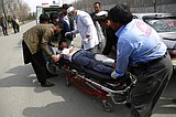 Officials say gunmen kill 32 at ceremony in Afghan capital