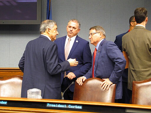 Commissioner of Administration Jay Dardenne, the governor's chief budget adviser, left; House Speaker Clay Schexnayder, R-Gonzales, center; and Senate President Page Cortez, R-Lafayette, speak ahead of a meeting of Louisiana's income forecasting panel on Friday, Feb. 7, 2020, in Baton Rouge, La. (AP Photo/Melinda Deslatte)