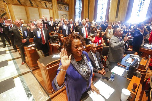 Barbara West Carpenter, D- Baton Rouge, and other members of the Louisiana House of Representatives are sworn in at the state Capitol in Baton Rouge, La., Monday, Jan. 13, 2020. (AP Photo/Brett Duke)