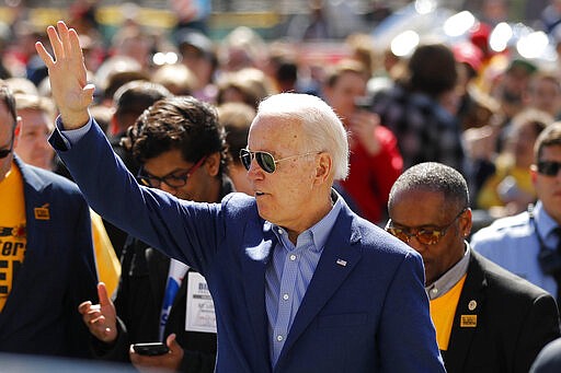 Democratic presidential candidate former Vice President Joe Biden waves to supporters after speaking during a campaign rally Saturday, March 7, 2020, in St. Louis. (AP Photo/Jeff Roberson)