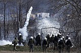 Tear gas sprayed across migrants at Turkey-Greece border