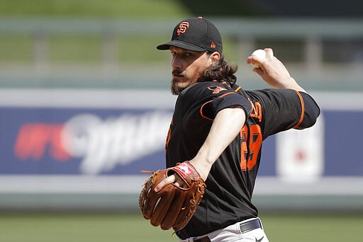 San Francisco Giants' Jeff Samardzija throws during the first inning of a spring training baseball game against the Arizona Diamondbacks, Monday, March 2, 2020, in Scottsdale, Ariz.(AP Photo/Darron Cummings)