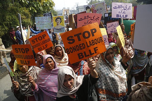 Pakistani activists take part in an International Women's Day rally in Lahore, Pakistan, Sunday, March 8, 2020. Pakistanis held rallies across the country. Officially recognized by the United Nations in 1977, it is celebrated around the world on March 8. (AP Photo/K.M. Chaudhry)