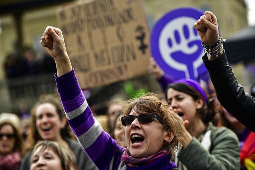 Women shout slogans during International Women's Day in Pamplona, northern Spain, Sunday, March 8, 2020. Spanish women are marking International Women's Day with a full day strike and dozens of protests across the country against wage gap and gender violence. (Alvaro Barrientos)