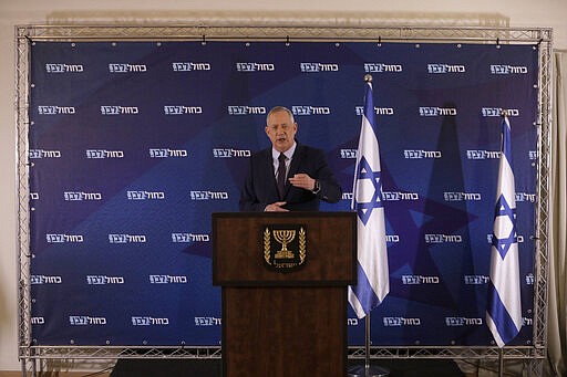 Blue and White party leader Benny Gantz delivers a statement in Tel Aviv, Israel, Saturday, March 7, 2020. (AP Photo/Sebastian Scheiner)