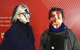 With painted faces, artists fight facial recognition tech