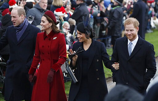 FILE - In this Tuesday, Dec. 25, 2018 file photo, Britain's Prince William, left, Kate, Duchess of Cambridge, second left, Meghan Duchess of Sussex and Prince Harry, right, arrive to attend the Christmas day service at St Mary Magdalene Church in Sandringham in Norfolk, England. Prince Harry and his wife, Meghan, are fulfilling their last royal commitment Monday March 9, 2020 when they appear at the annual Commonwealth Service at Westminster Abbey. It is the last time they will be seen at work with the entire Windsor clan before they fly off into self-imposed exile in North America. (AP Photo/Frank Augstein, file)