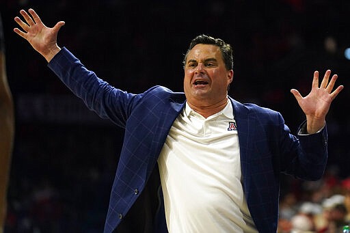 Arizona coach Sean Miller reacts to a foul call during the second half of the team's NCAA college basketball game against Washington on Saturday, March 7, 2020, in Tucson, Ariz. Washington won 69-63. (AP Photo/Rick Scuteri)