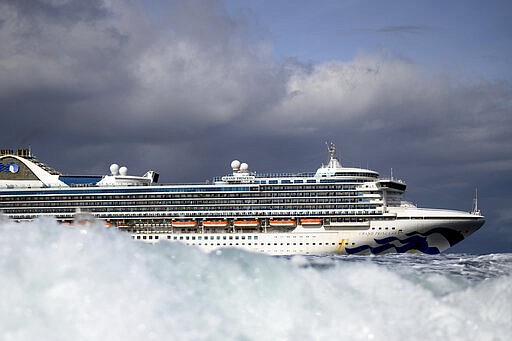 Carrying multiple people who have tested positive for COVID-19, the Grand Princess maintains a holding pattern about 30 miles off the coast of San Francisco, Sunday, March 8, 2020. The cruise ship is scheduled to dock at the Port of Oakland on Monday. (AP Photo/Noah Berger)