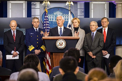 Vice President Mike Pence with, from left, U.S. Food and Drug Administration Commissioner Stephen Hahn, Coast Guard Vice Adm. Daniel Abel, White House coronavirus response coordinator Dr. Deborah Birx, Director of the National Institute of Allergy and Infectious Diseases at the National Institutes of Health Anthony Fauci and Assistant Secretary for Preparedness and Response at the Department of Health &amp; Human Services Robert Kadlec, speaks to reporters during a coronavirus briefing in the Brady press briefing room of the White House, Friday, March 6, 2020, in Washington. (AP Photo/Manuel Balce Ceneta)