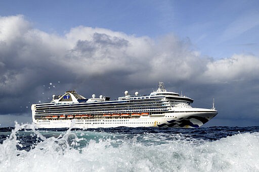 Carrying multiple people who have tested positive for COVID-19, the Grand Princess maintains a holding pattern about 30 miles off the coast of San Francisco, Sunday, March 8, 2020. The cruise ship is scheduled to dock at the Port of Oakland on Monday. (AP Photo/Noah Berger)