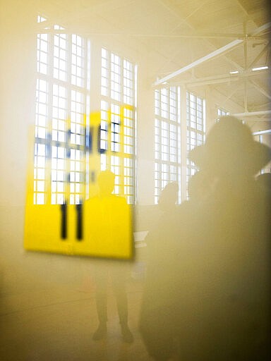 People cast their ballot at Haskell Community Center in Flint, Mich., Tuesday, March 10, 2020. (Jake May/The Flint Journal via AP)