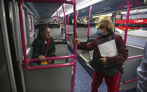 Female passengers travel in the near empty women&#146;s section of the metro bus during the national women's strike &quot;A Day Without Women&quot; in Mexico City, Monday, March 9, 2020. Thousands of women across Mexico went on strike after an unprecedented number of girls and women hit the streets to protest rampant gender violence on International Women's Day. (AP Photo/Marco Ugarte)