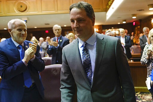 Todd Huston, R-Fishers, enters the House Chamber before being sworn in as Speaker of the House at the Statehouse in Indianapolis, Monday, March 9, 2020.(AP Photo/AJ Mast)