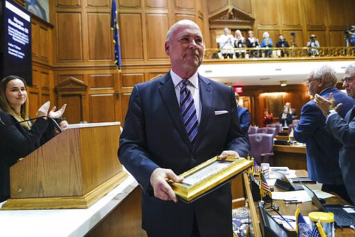 Former Speaker of the House Brian Bosma, R-Indianapolis, leaves the podium after speaking on a resolution marking his stepping down from the post at the Statehouse in Indianapolis, Monday, March 9, 2020.(AP Photo/AJ Mast)