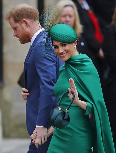 Britain's Prince Harry and Meghan, Duchess of Sussex arrive to attend the annual Commonwealth Day service at Westminster Abbey in London, Monday, March 9, 2020. The annual service organised by the Royal Commonwealth Society, is the largest annual inter-faith gathering in the United Kingdom. (AP Photo/Frank Augstein)
