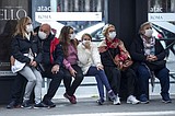 The Latest: China records another low in new virus cases