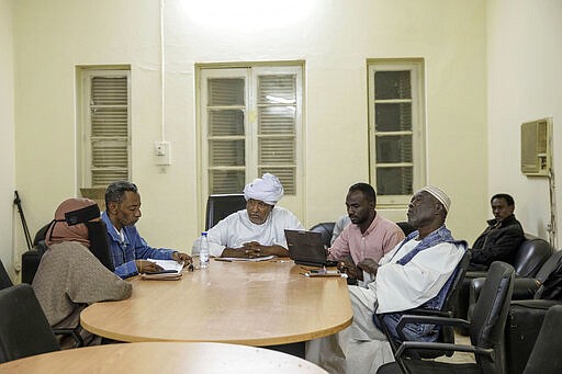 In this Jan. 11, 2020 photo, Sudanese families who lost loved ones during last years' revolution gather for a meeting, at the Revolutionary Martyrs Center, in Khartoum, Sudan. Sudan's young protesters who led the uprising against former President Omar al-Bashir say they've lost trust in the generals leading the country after a brutal crackdown on their sit-in last summer by security forces that killed dozens. The generals have shown little willingness to hand over power to a civilian-led administration, one the demonstrators' key demands.&#160;(AP Photo/Nariman El-Mofty)