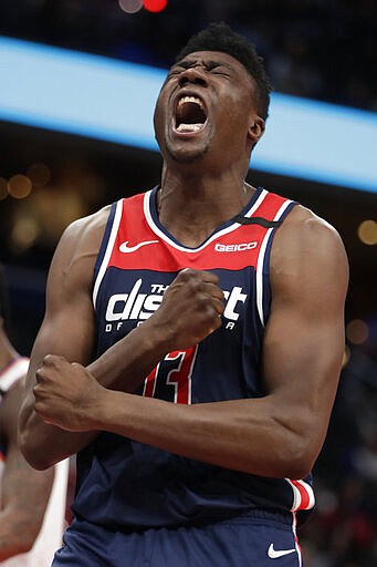 Washington Wizards' Thomas Bryant reacts after being fouled during the second half of the team's NBA basketball game against the New York Knicks, Tuesday, March 10, 2020, in Washington. (AP Photo/Luis M. Alvarez)