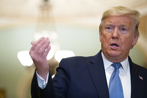 President Donald Trump speaks to reporters about the coronavirus outbreak on Tuesday, March 10, 2020, on Capitol Hill in Washington. (AP Photo/Alex Brandon)